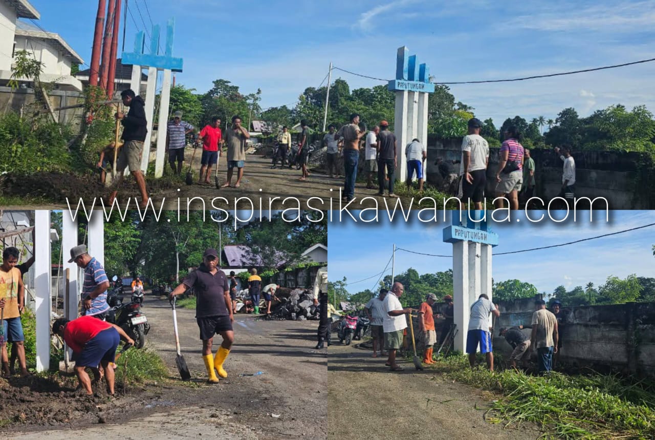 Gotong royong warga desa Paputungan bangun Gapura Desa.